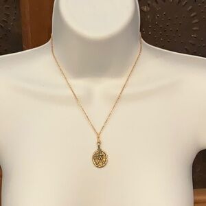The Elizabethโ Taylor Zodiac Necklace